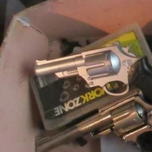 Man charged after stash of weapons seized from Gold Coast home