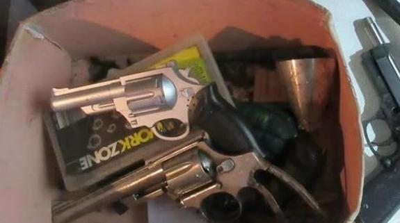 Man charged after stash of weapons seized from Gold Coast home