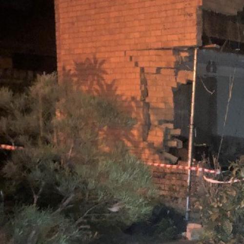 Woman left for dead after stolen car ploughs into Brisbane home