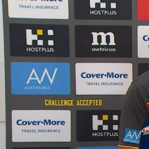 Suns AFL coach leaps to Rankine defence