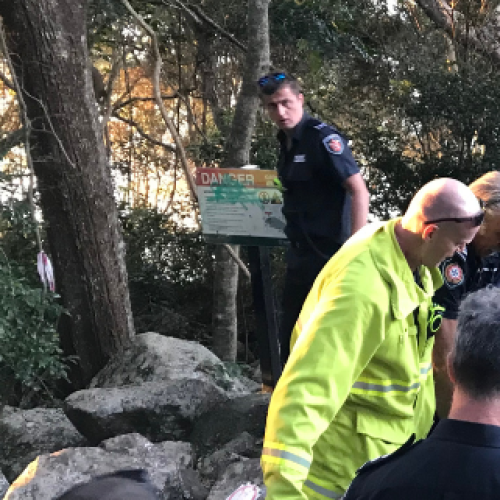 Woman rescued after slipping off cliff in Burleigh Heads