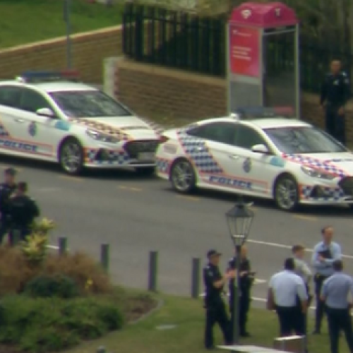 Man shot by police in Brisbane suburb after officer stabbed