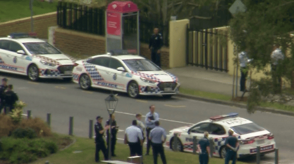 Man shot by police in Brisbane suburb after officer stabbed