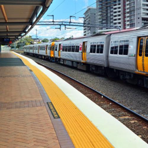 Gold Coast line trains suspended after vehicle drives onto tracks