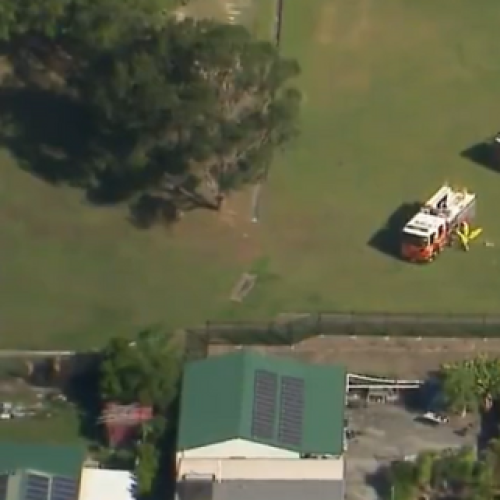 Child, two adults injured after car ploughs onto Logan school oval