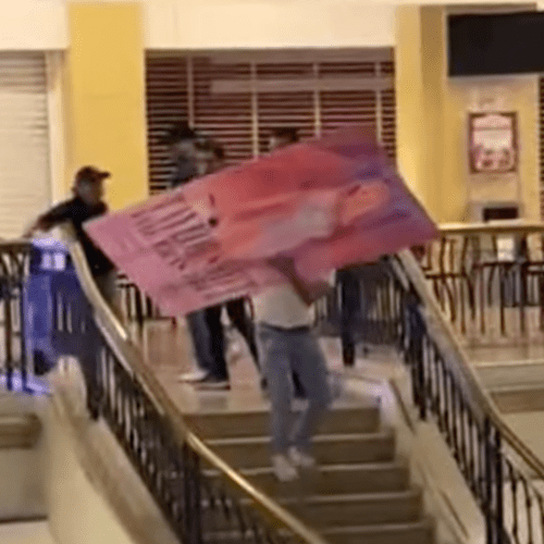 Man Goes Viral For Stealing Eras Tour Poster For His Girlfriend