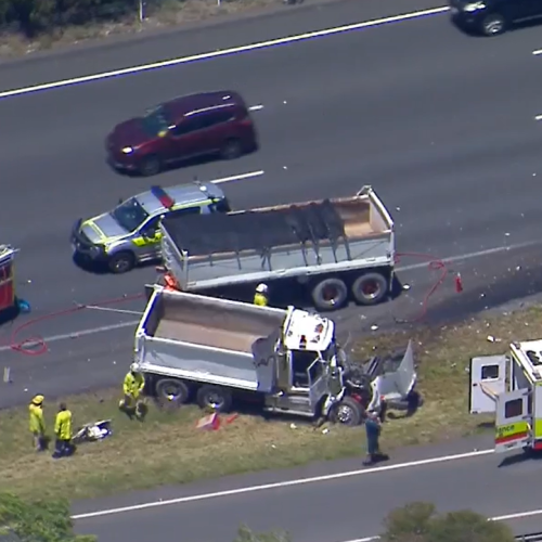 Lengthy delays on M1 as dozens involved in crash between bus and truck
