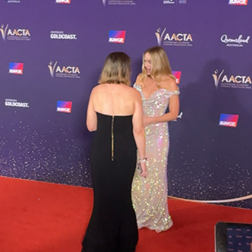 Margot Robbie was overheard talking about Aussie fans on the red carpet