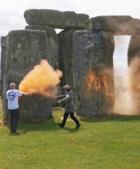 Climate Protesters Turn Stonehenge Orange to Raise Awareness About Fossil Fuel Use