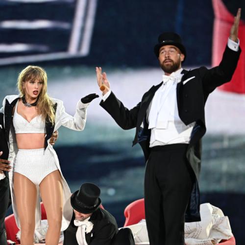 Taylor and Travis Take The Stage At Wembley
