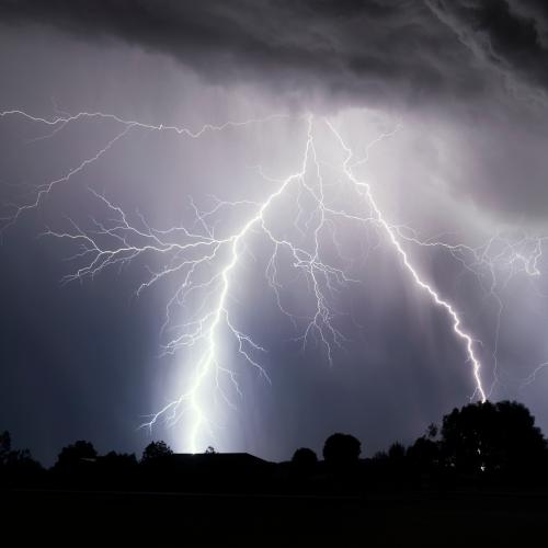 Gold Coast wakes to early morning light show after hot, powerless night