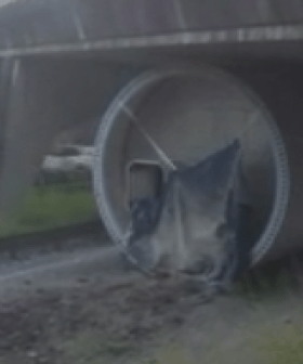 Major highway closed after oversized truck crashes into bridge