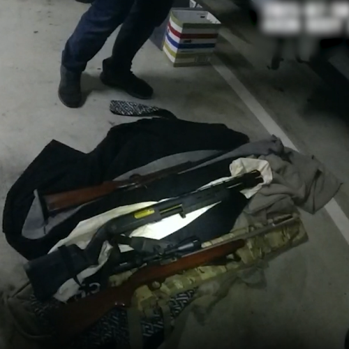 WATCH: Man, woman charged after raids uncover drugs, weapons