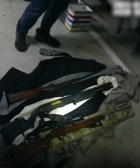 WATCH: Man, woman charged after raids uncover drugs, weapons
