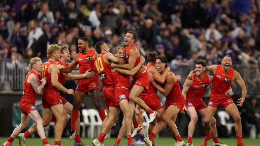 Gold Coast Suns rise to historic finals win in Perth