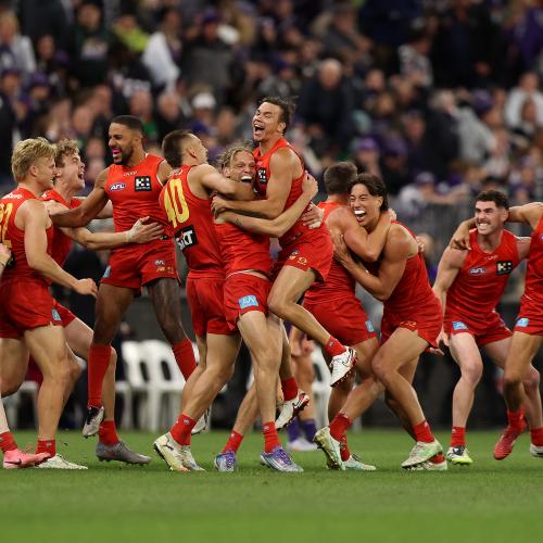 Gold Coast Suns rise to historic finals win in Perth