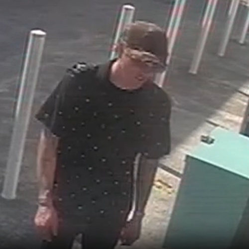 Police release vision of wanted gunman after Gold Coast servo robbery