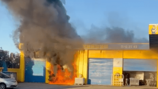 Police declare emergency in Burleigh as tyre shop goes up in flames