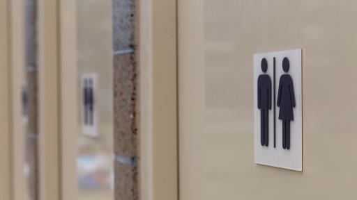 Man charged after allegedly filming woman inside Gold Coast bathroom