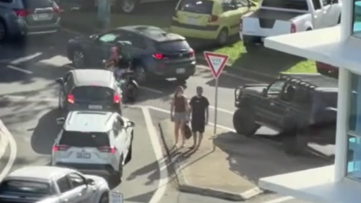 WATCH: Driver charged after dangerously swerving through packed Coolangatta streets