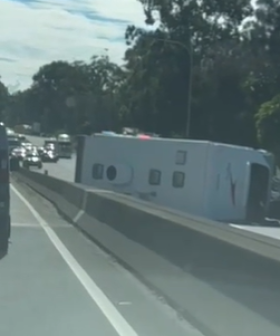 Traffic chaos as caravan rollover shuts down M1 southbound