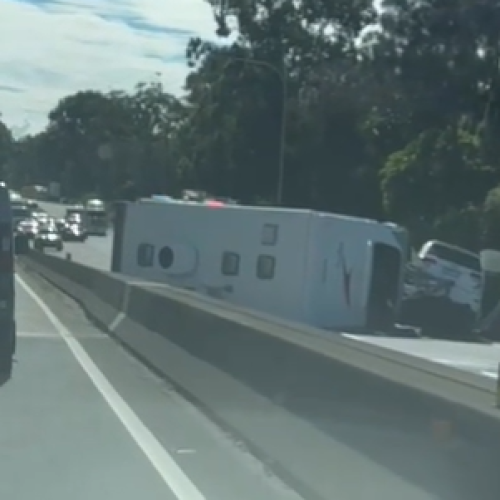 Traffic chaos as caravan rollover shuts down M1 southbound